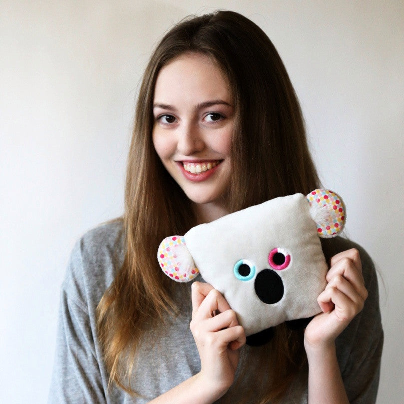 Plush toy koala bear stuffed animal with a useful back pocket, designed by young entrepreneurs